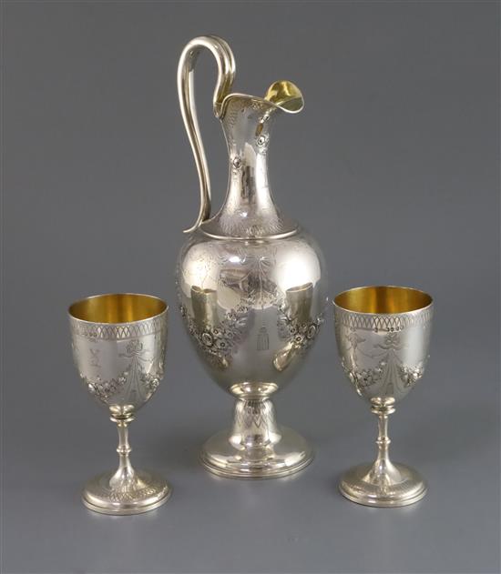 A Victorian silver ewer and a pair of matching goblets by Edward & John Barnard, 35.5 oz.
